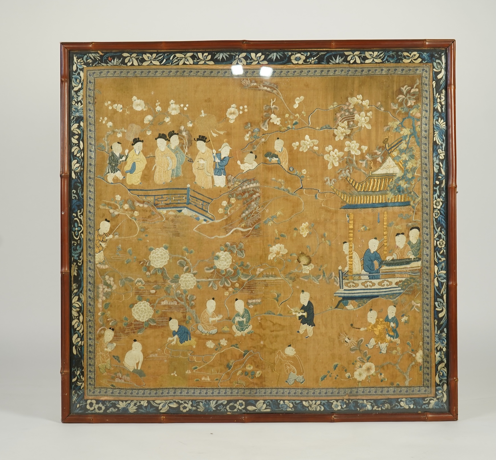 A large Chinese embroidered silk 'boys' panel, 19th century